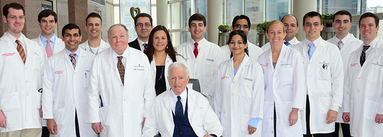 Dr. James T. Willerson and Dr. Denton A. Cooley with cardiology fellows