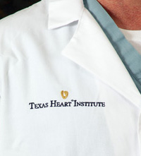 Close up of THI logo on lab coat