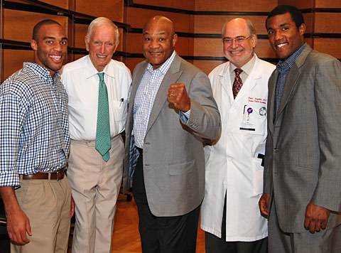 George Foreman (center), spokesperson for the Center for Coronary Artery Anomalies.